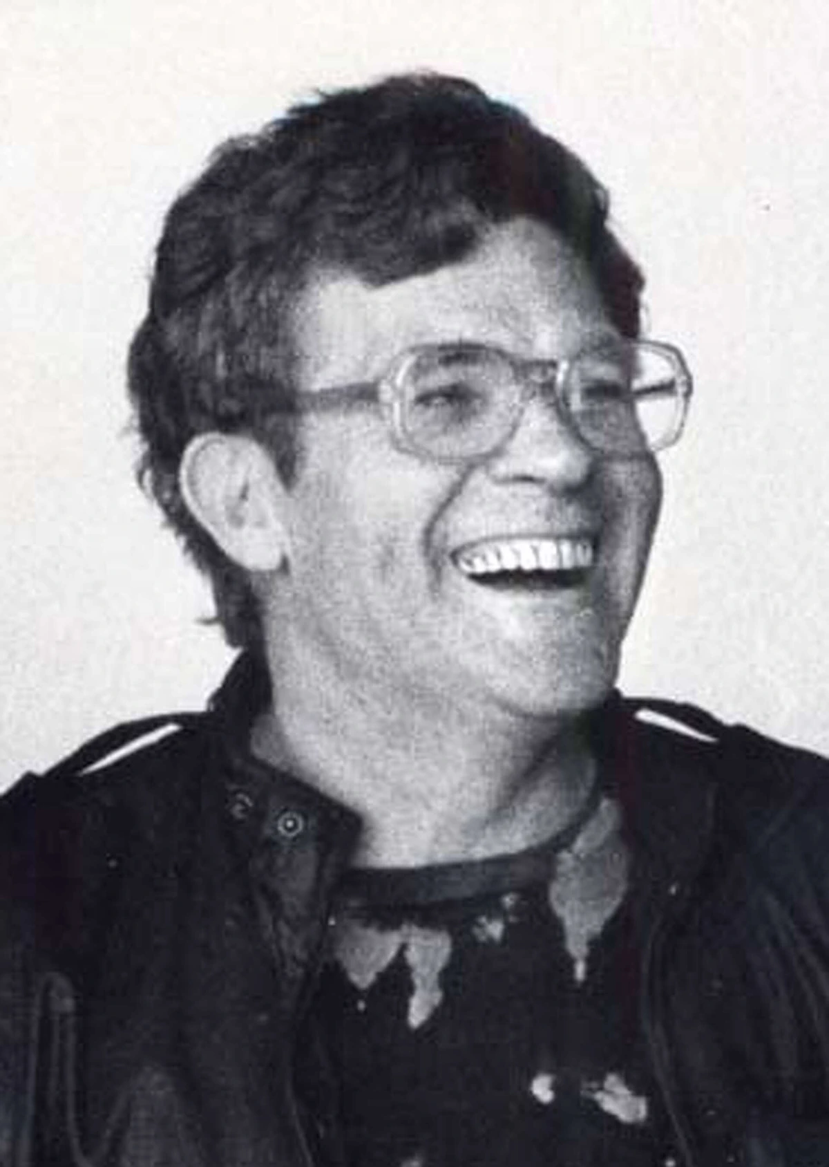 Black-and-white Chronicle file photograph of journalist and Zodiac suspect Richard Gaikowski wearing glasses and smiling.